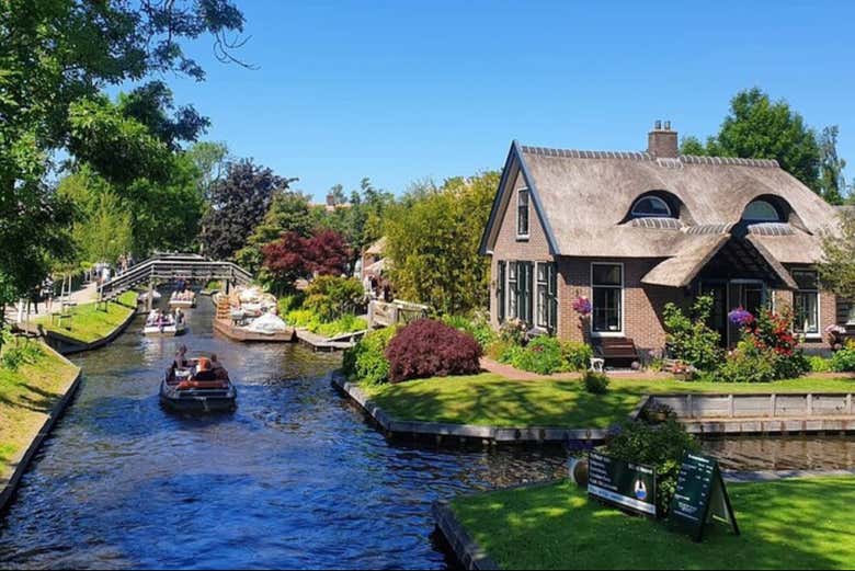 Sail along a canal in Giethoorn
